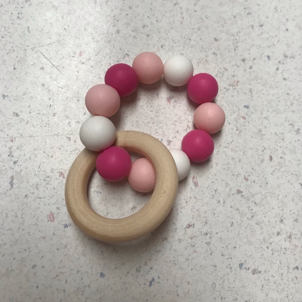 Silicone and wood teether